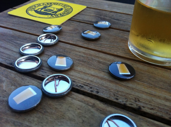 Badges with beer on them