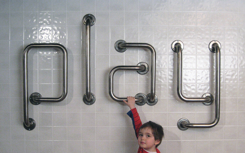 Piping with child and tubing saying 'play'