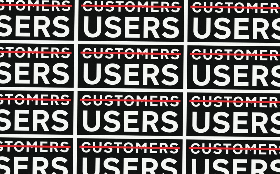 Tessellating GDS stickers crossing out "customers" and with "users" instead