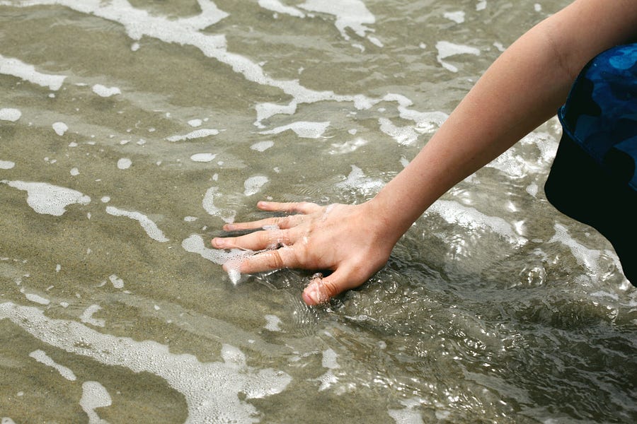hand in the sea